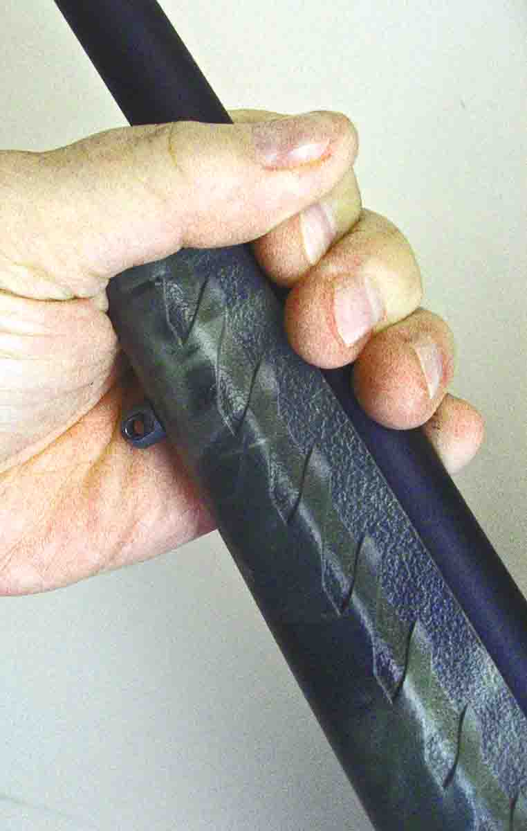 Forends on many of today’s injection- molded stocks are flexible. To test for clearance, grab the barrel and forend tip and squeeze. If the forend touches the barrel, more space is needed to float the barrel during firing.